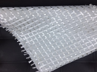 Warp knitted composite geotextile